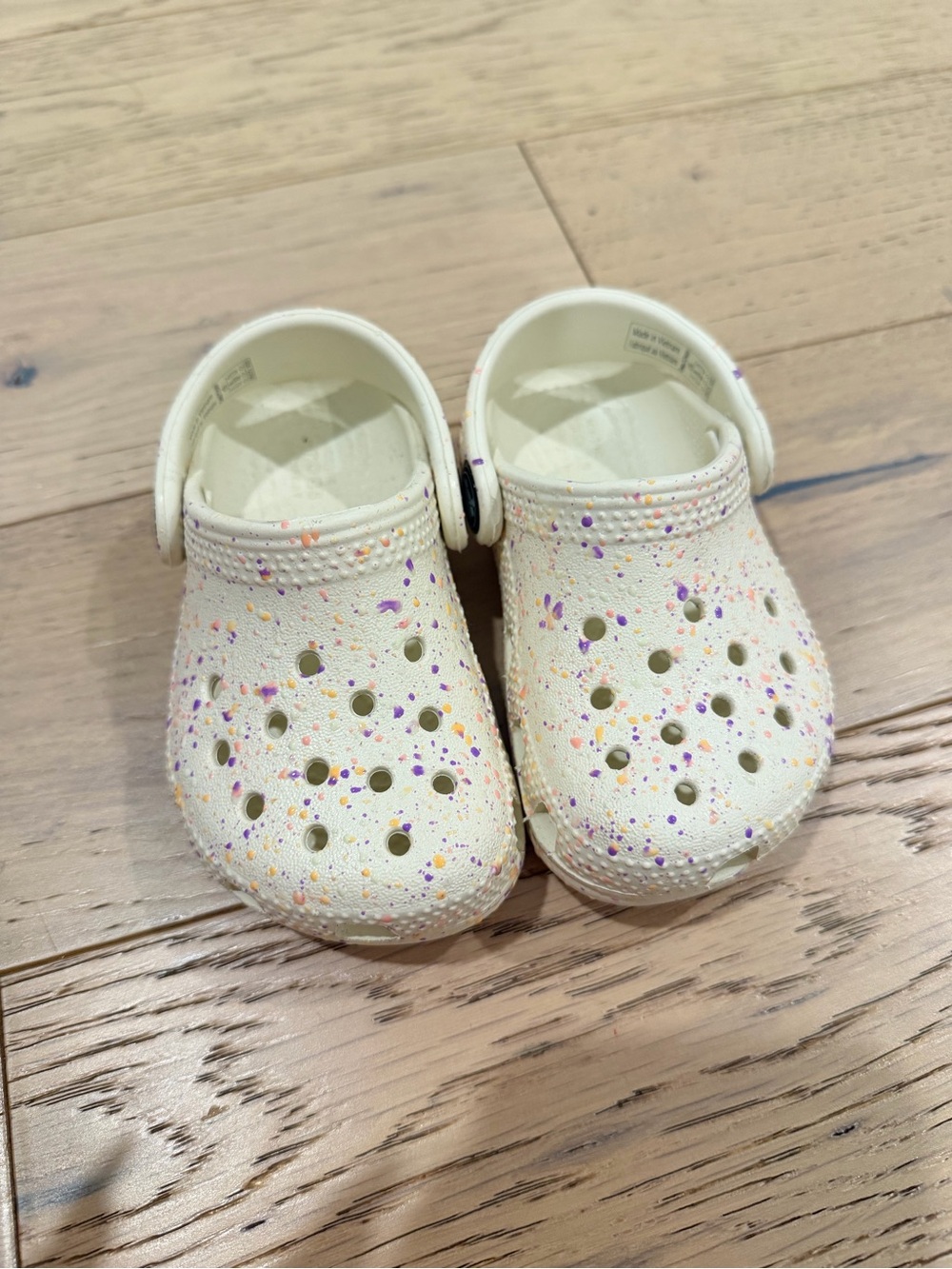 CROCS Kids Cream Foam Clogs with Purple & Orange Speckle